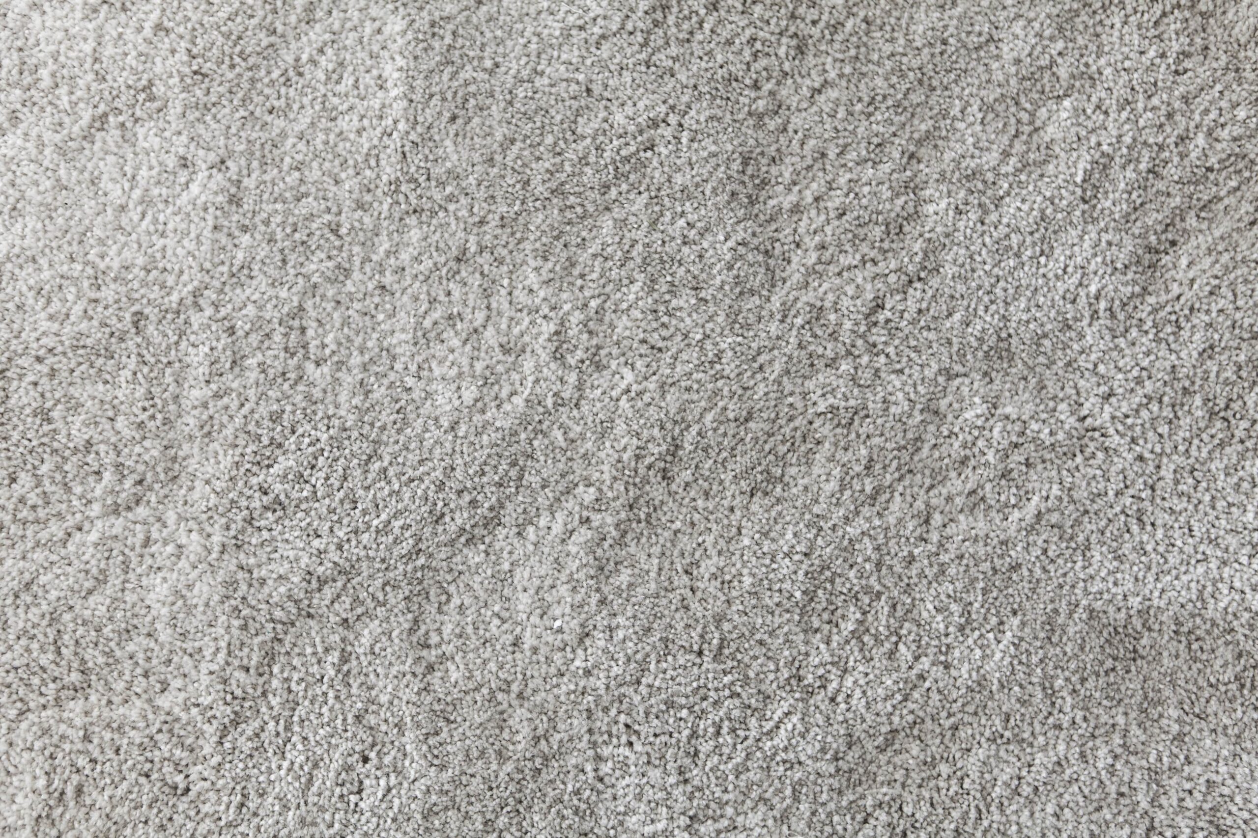 Up-close photo of white carpet