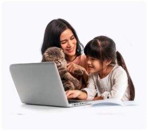 daughter and mom looking at laptop and holding a cat
