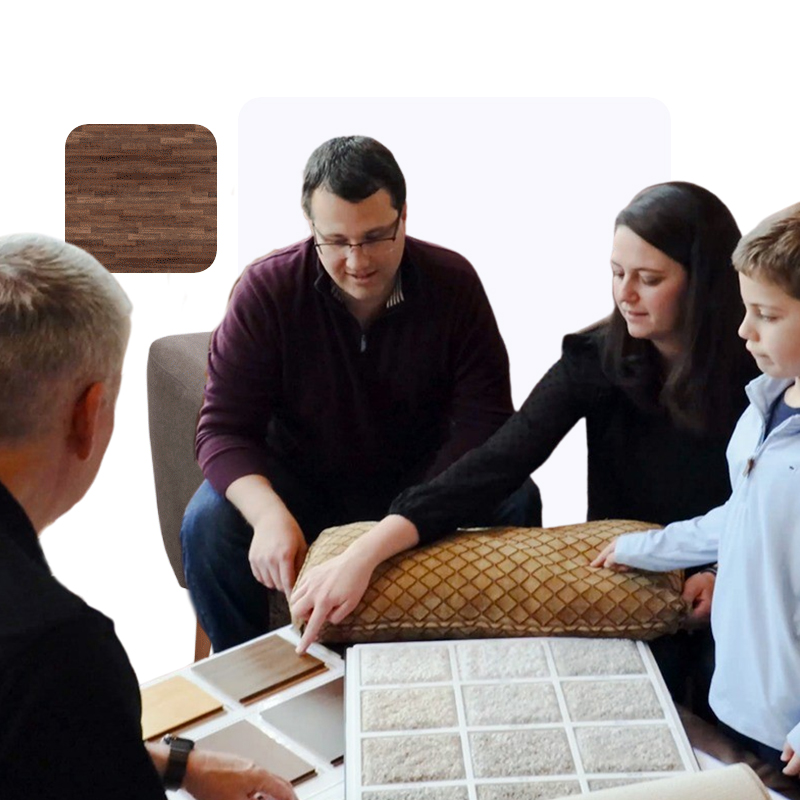 family looking at flooring samples