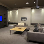 home theater with carpet in basement