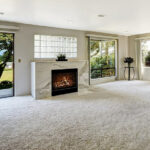 carpet in living room surrounding fireplace