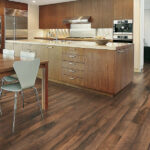 kitchen with distressed wood flooring
