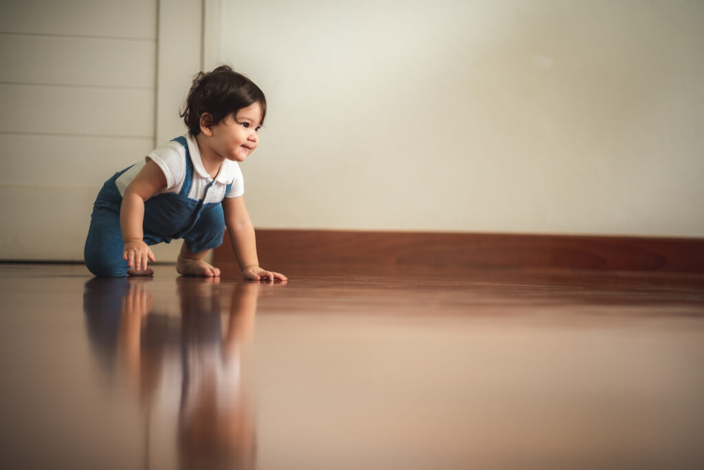 cute toddler little child family concept, baby learning to walk with father and mother to help care and holding hand, first step with childhood parent support, small love portrait little boy at home